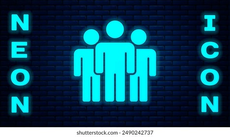 Glowing neon Users group icon isolated on brick wall background. Group of people icon. Business avatar symbol - users profile icon.  Vector