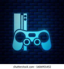 Glowing neon Video game console with joystick icon isolated on brick wall background.  Vector Illustration