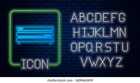 Glowing neon Video game console icon isolated on brick wall background. Neon light alphabet. Vector Illustration