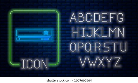 Glowing neon Video game console icon isolated on brick wall background. Neon light alphabet. Vector Illustration