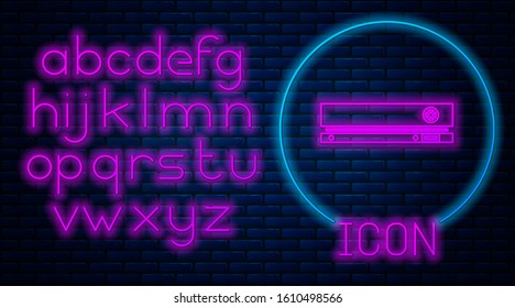 Glowing neon Video game console icon isolated on brick wall background. Neon light alphabet. Vector Illustration