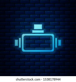 Glowing neon Virtual reality glasses icon isolated on brick wall background. Stereoscopic 3d vr mask.  Vector Illustration