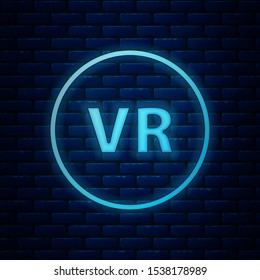 Glowing neon Virtual reality icon isolated on brick wall background.  Vector Illustration