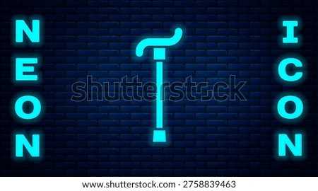 Glowing neon Walking stick cane icon isolated on brick wall background.  Vector