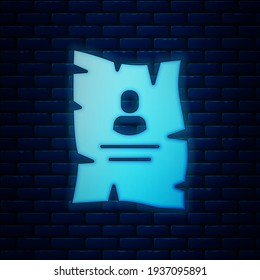 Glowing neon Wanted western poster icon isolated on brick wall background. Reward money. Dead or alive crime outlaw.  Vector
