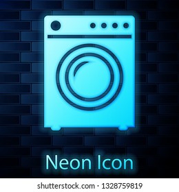 Glowing neon Washer icon isolated on brick wall background. Washing machine icon. Clothes washer - laundry machine. Home appliance symbol. Vector Illustration