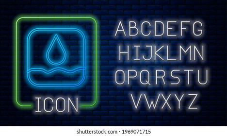 Glowing neon Water drop icon isolated on brick wall background. Neon light alphabet. Vector