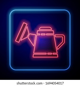 Glowing neon Watering can icon isolated on blue background. Irrigation symbol.  Vector Illustration