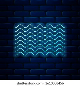 Glowing neon Waves icon isolated on brick wall background.  Vector Illustration