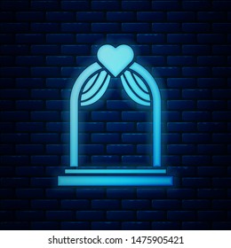 Glowing neon Wedding arch icon isolated on brick wall background. Wedding decoration.  Vector Illustration
