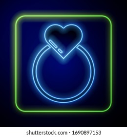 Glowing neon Wedding rings icon isolated on blue background. Bride and groom jewelry sign. Marriage symbol. Diamond ring.  Vector Illustration