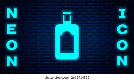 Glowing neon Whiskey bottle icon isolated on brick wall background.  Vector Illustration