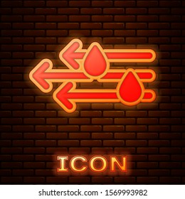 Glowing neon Wind and rain icon isolated on brick wall background. Windy weather.  Vector Illustration