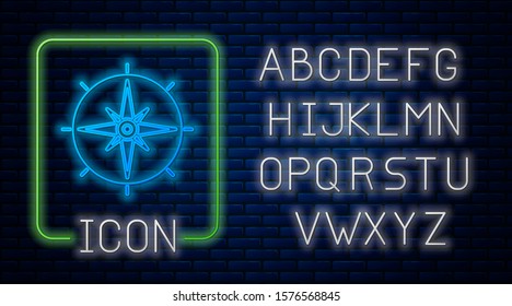 Glowing neon Wind rose icon isolated on brick wall background. Compass icon for travel. Navigation design. Neon light alphabet. Vector Illustration