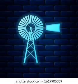 Glowing neon Windmill icon isolated on brick wall background.  Vector Illustration