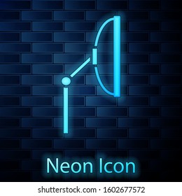 Glowing neon Windscreen wiper icon isolated on brick wall background.  Vector Illustration