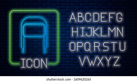 Glowing neon Winter hat with ear flaps icon isolated on brick wall background. Neon light alphabet. Vector Illustration