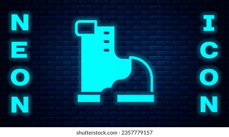 Glowing neon Winter warm boot icon isolated on brick wall background. Waterproof rubber boot.  Vector