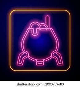 Glowing neon Witch cauldron icon isolated on black background. Happy Halloween party.  Vector