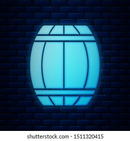 Glowing neon Wooden barrel icon isolated on brick wall background. Alcohol barrel, drink container, wooden keg for beer, whiskey, wine.  Vector Illustration