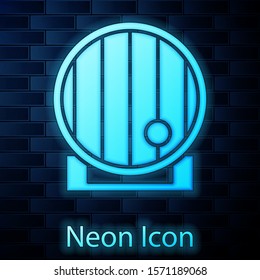 Glowing neon Wooden barrel icon isolated on brick wall background. Alcohol barrel, drink container, wooden keg for beer, whiskey, wine.  Vector Illustration
