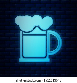 Glowing neon Wooden beer mug icon isolated on brick wall background.  Vector Illustration