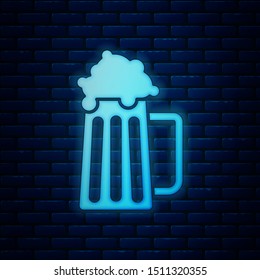 Glowing neon Wooden beer mug icon isolated on brick wall background.  Vector Illustration