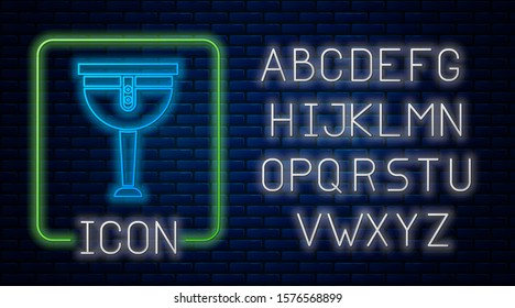 Glowing neon Wooden pirate leg icon isolated on brick wall background. Neon light alphabet. Vector Illustration