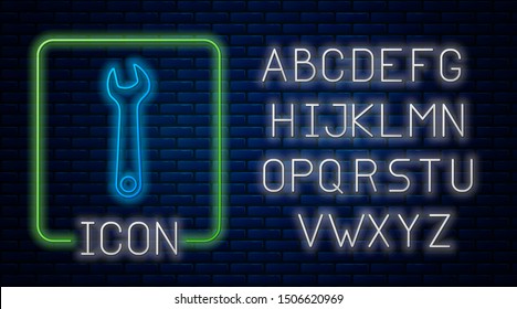 Glowing neon Wrench icon isolated on brick wall background. Spanner repair tool. Service tool symbol. Neon light alphabet. Vector Illustration