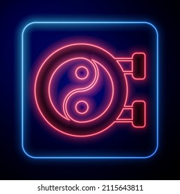 Glowing neon Yin Yang symbol of harmony and balance icon isolated on black background.  Vector