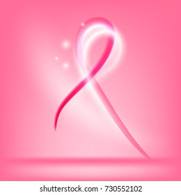 Glowing October breast cancer awareness month pink ribbon with sparkles on bright pink background