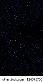 Glowing particles, polka dots on a dark blue background. Vertical festive banner. An elegant holiday pattern. Vector illustration.