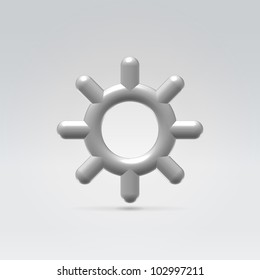 Glowing polished rounded metallic icon hanging over light background