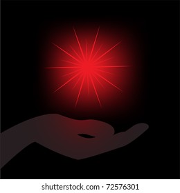 glowing red star in the palm  on a black background