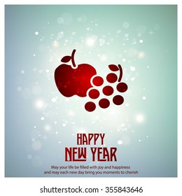 Glowing red typography with apple and Grapes Icon on blue background - 2016 Happy New Year Greeting Card Design Creative Typography - Colorful Background