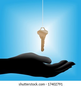 A glowing shiny brass house key on a string drops into a cupped open hand held out, symbolic of a real estate sale.