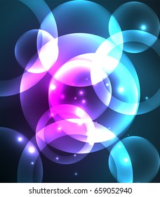 Glowing shiny overlapping circles composition on dark background, magic style light effects abstract design template