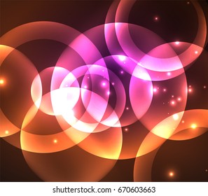Glowing shiny overlapping circles composition on dark background, magic style light effects abstract design template