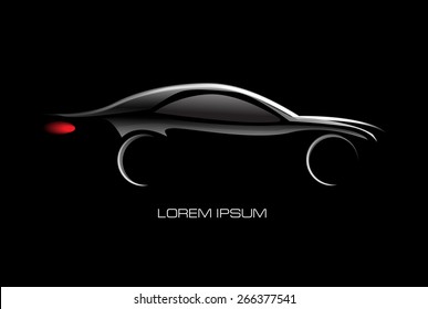 Glowing silhouette of the car isolated on a black background 