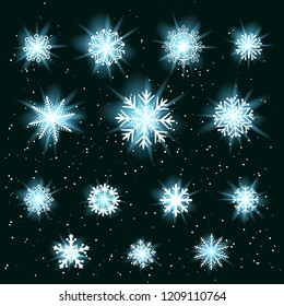 Glowing snow set. Collection of white glow snowflakes variation isolated on dark snowy background. Ice shape pattern. Winter Christmas holiday decoration