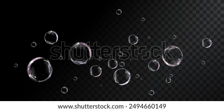 Glowing soap bubbles on black background. Colorful soap bubble on black background. 3D soap balloon. Foam, powder, soap, detergent.	
