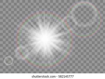 Glowing sun rays sparkle star with lens flare effect on transparent vector background.