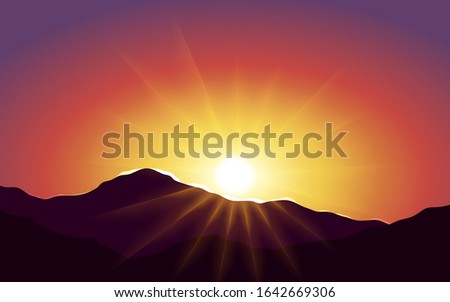 Glowing sunset on mountain with sunbeam