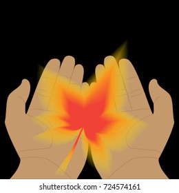 glowing transparent leaf in hands on a black background. palms of hands stretching leaf