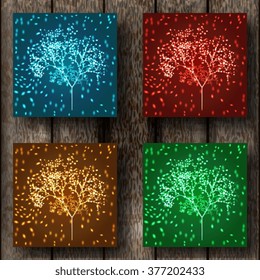 glowing tree. set on wooden background