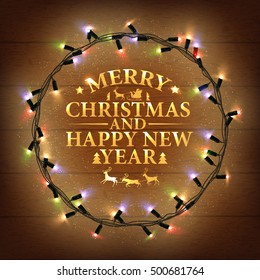 Glowing Varicolored Christmas Lights Wreath for Xmas Holiday Greeting Cards Design. Wooden Vector Background. Golden Lettering.