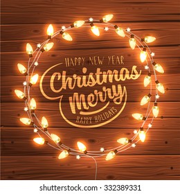 Glowing White Christmas Lights Wreath for Xmas Holiday Greeting Cards Design. Wooden Hand Drawn Background.
