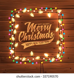 Glowing White Christmas Lights Wreath For Xmas Holiday Greeting Cards Design. Wooden Hand Drawn Background.