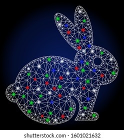 Glowing white mesh rabbit with sparkle effect. Abstract illuminated model of rabbit. Shiny wire frame triangular mesh rabbit icon. Vector abstraction on a dark blue gradient background.