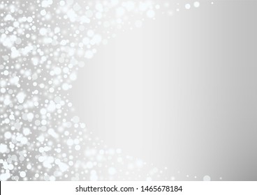 Glowing white snow flakes christmas background. Actual winter flying silver snowflake overlay template.Subtle flying snow on light grey background.